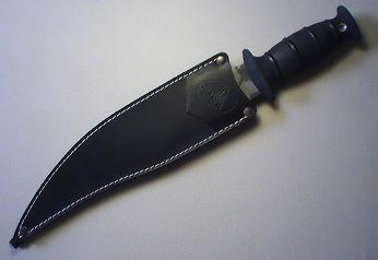 knife in unlatched sheath